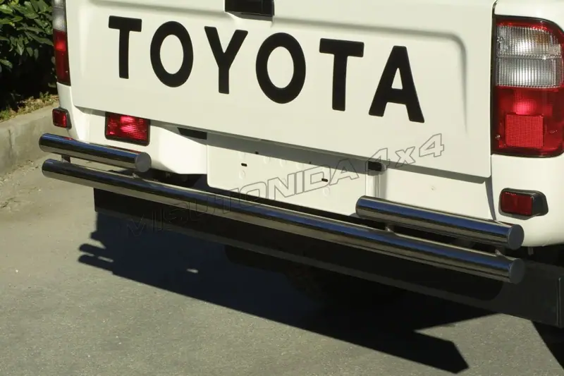 Double rear protection ø63, mirror polished — Toyota Hilux (2005–2011)