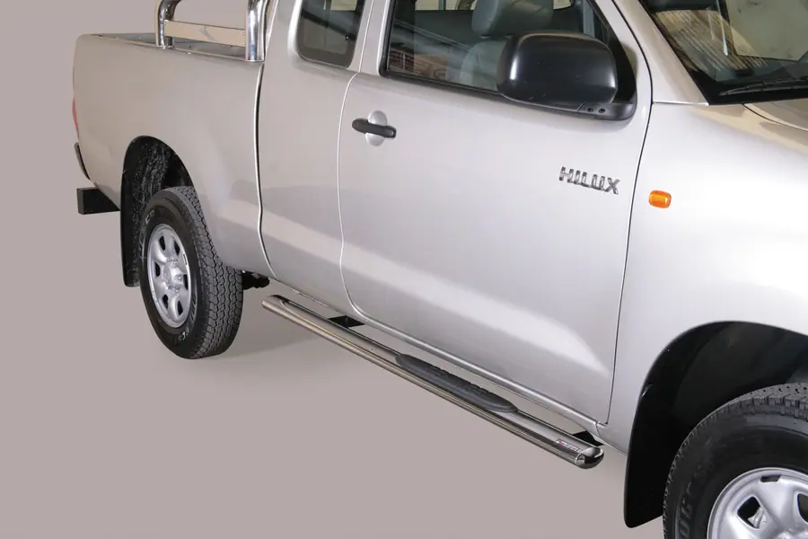 Овальные пороги Grand Pedana с пластиковыми накладками øovaal, полированная — Toyota Hilux (2005–2011)
